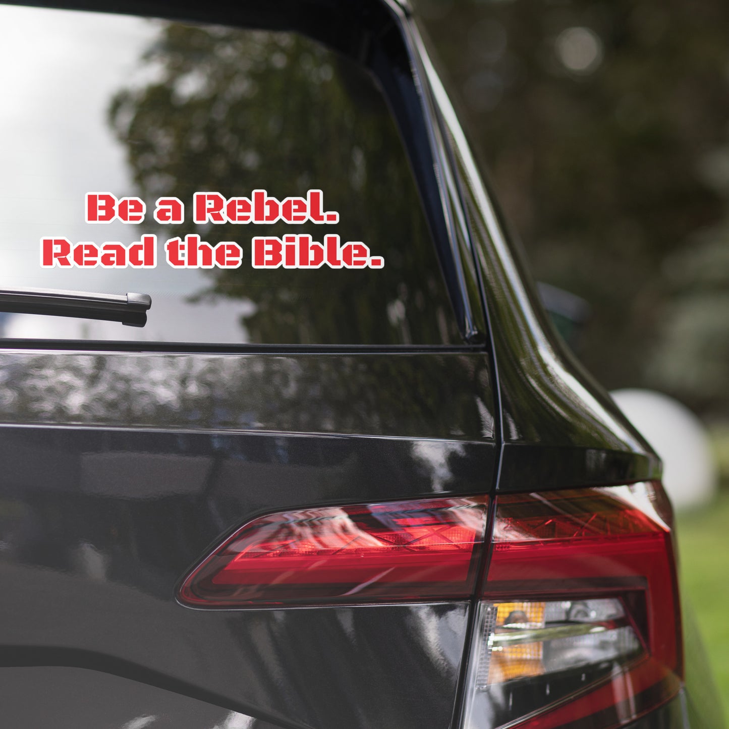 'Be a Rebel. Read the Bible.' 15"x3.75" BlackOps Font Red Bubble-free stickers